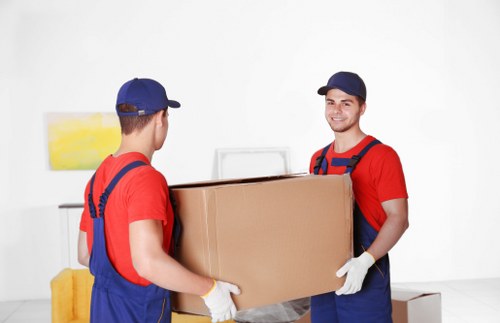 Packed boxes and furniture sized for a load-based moving quote