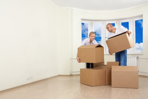 Loading furniture into a truck near Docklands apartments