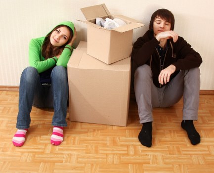 Staff working with insured moving service in a busy urban area