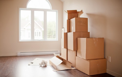 Packed moving boxes and furniture for a local Canary Wharf move