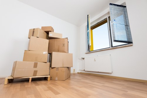 House removal van outside a modern Docklands property