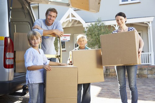 Movers handling apartment access in Canary Wharf