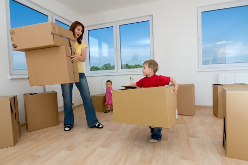 Local moving team handling apartment access in Canary Wharf