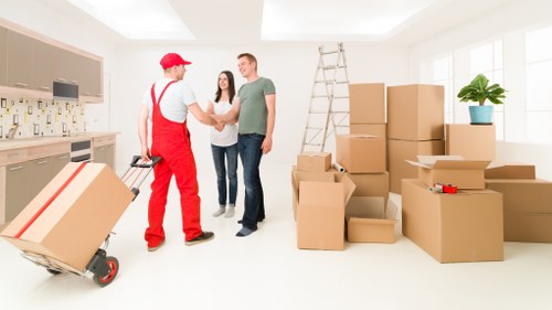 Office move coordination with building access and lift booking in Canary Wharf