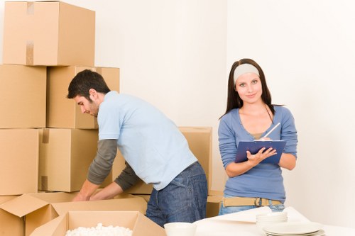 Packed boxes and furniture ready for a Canary Wharf van move