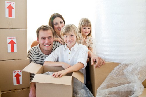 Local business moving team handling office furniture access near Canary Wharf